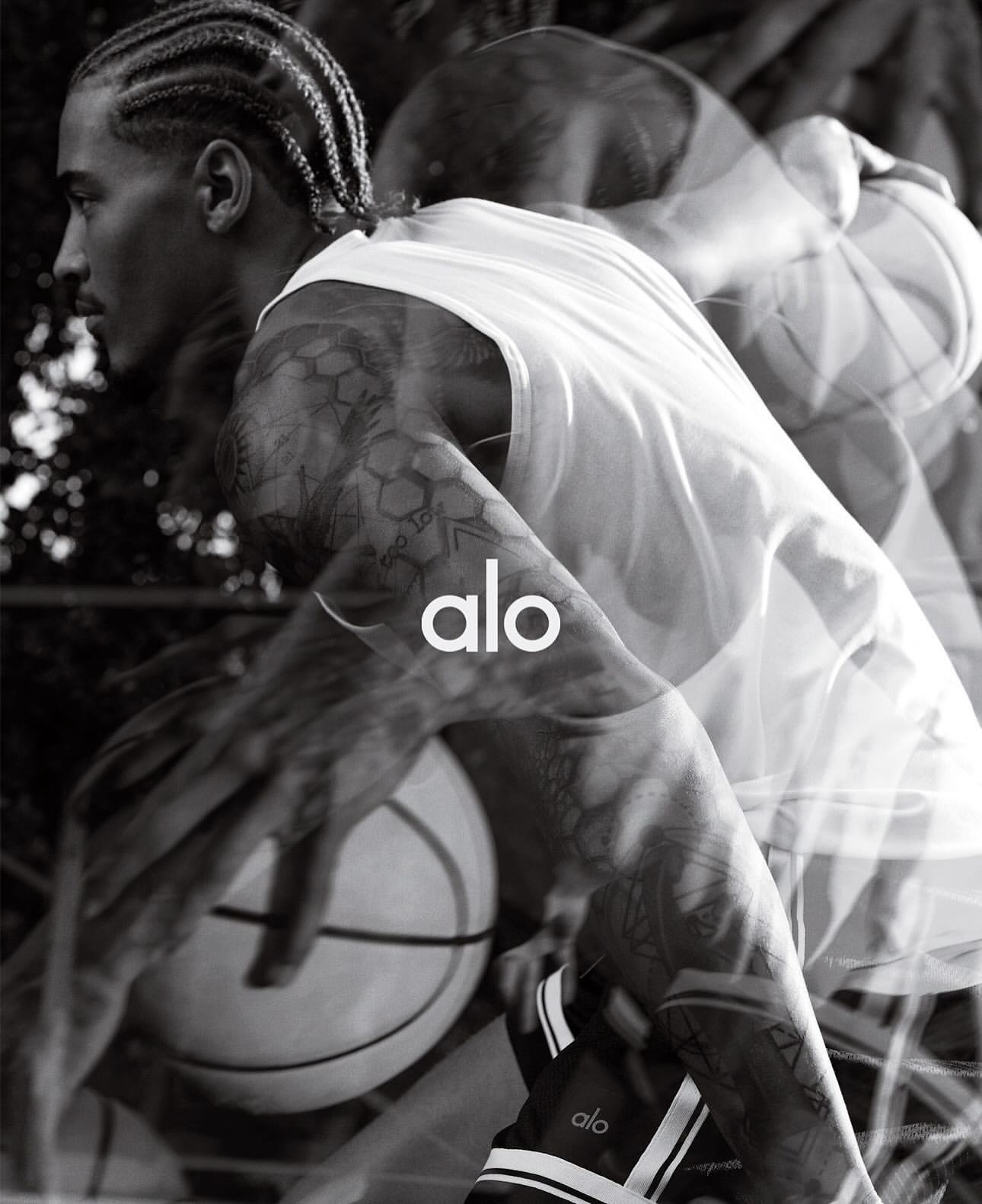 Monochrome multiple exposure photograph of a basketball player holding a ball outdoors by photographer Bryan Rodner Carr.