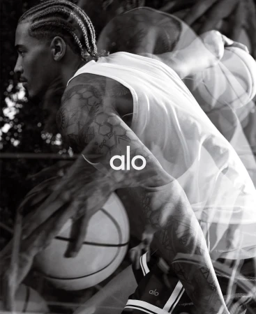 Monochrome multiple exposure photograph of a basketball player holding a ball outdoors by photographer Bryan Rodner Carr.