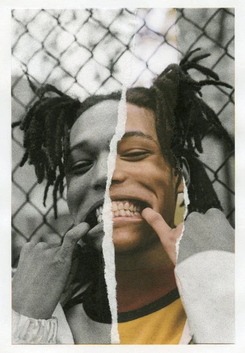 Collage art featuring a partially torn image of a young adult with dreadlocks, showing a half grayscale, half colour face with a smile.