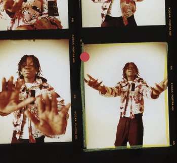 Contact sheet of medium-format film frames featuring a young Black man wearing a camouflage jacket against a plain background