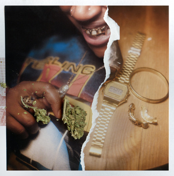 Collage featuring a person with gold teeth holding cannabis, alongside a gold watch and jewelry, set on a torn paper background.
