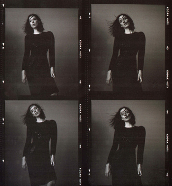 Black and white portrait of a woman in a black dress, captured across four frames of Kodak film with hair slightly blowing in the wind.