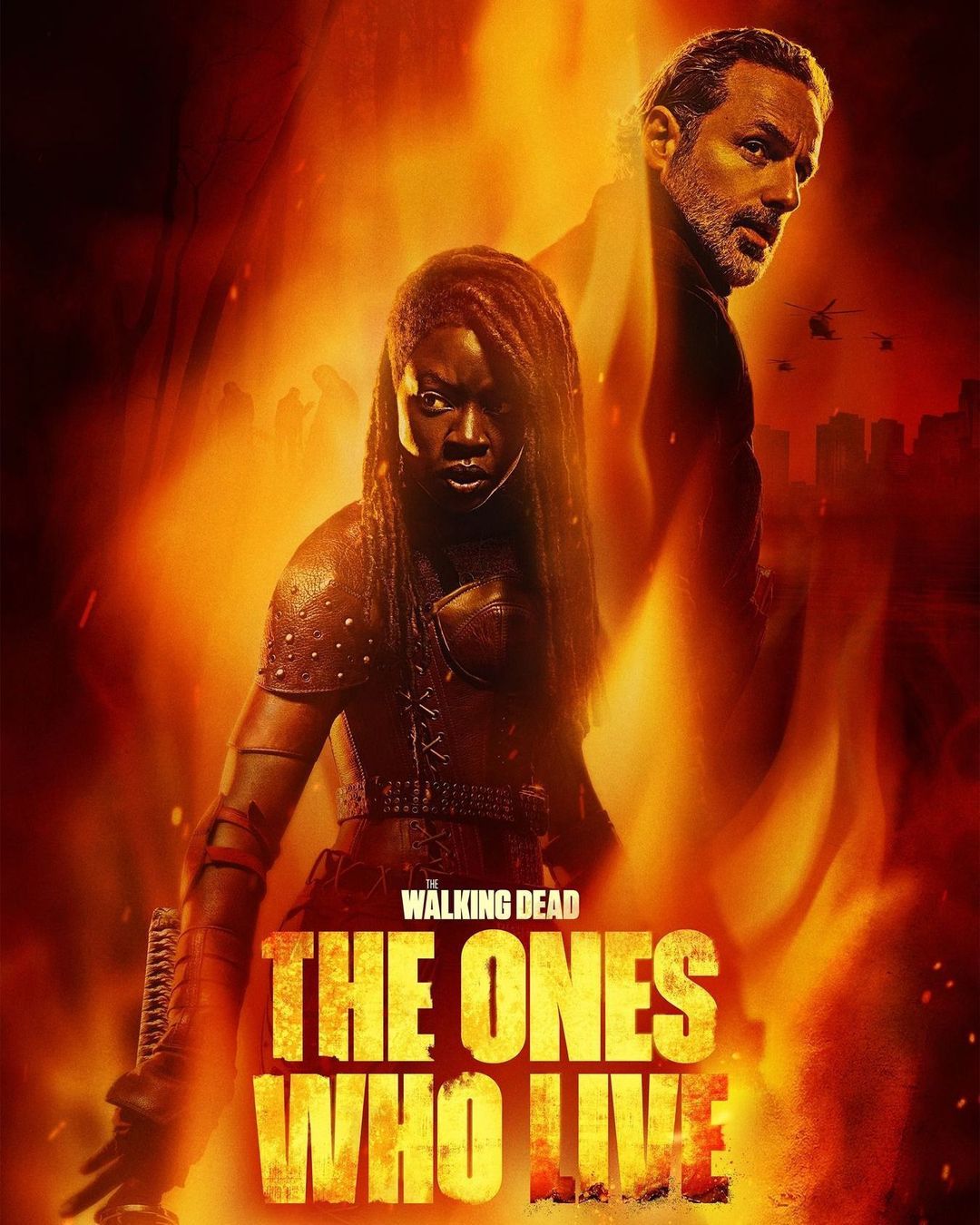 Movie poster for The Walking Dead: The Ones Who Live features Michonne and Rick Grimes with fiery orange and red tones and a cityscape background.