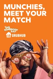 Snoop Dogg wearing pink suit, patterned headscarf and aviator sunglasses reflecting doughnuts against orange background.