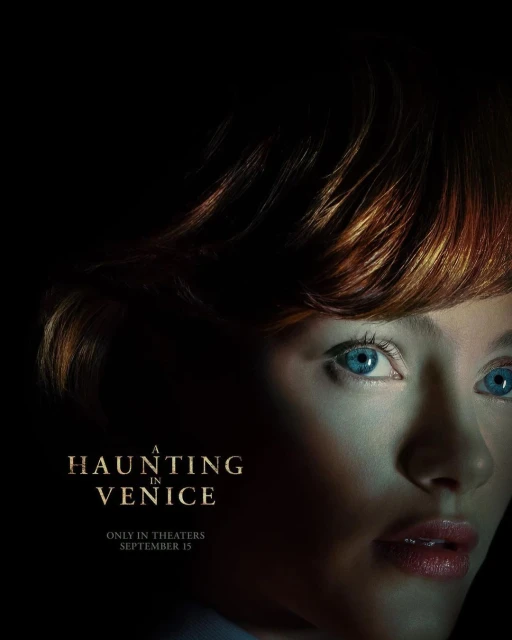 Movie poster for A Haunting in Venice featuring a close-up of a fair-skinned woman with red hair and blue eyes in a dark setting.