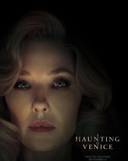 Close-up of a woman with blonde, wavy hair and blue eyes, looking directly at the viewer in a dimly lit movie poster for 'A Haunting in Venice'.