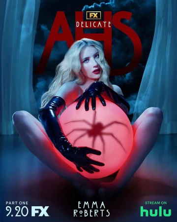 Emma Roberts stars in AHS: Delicate Part One, a promotional image features her holding a glowing orb with spider shadows.
