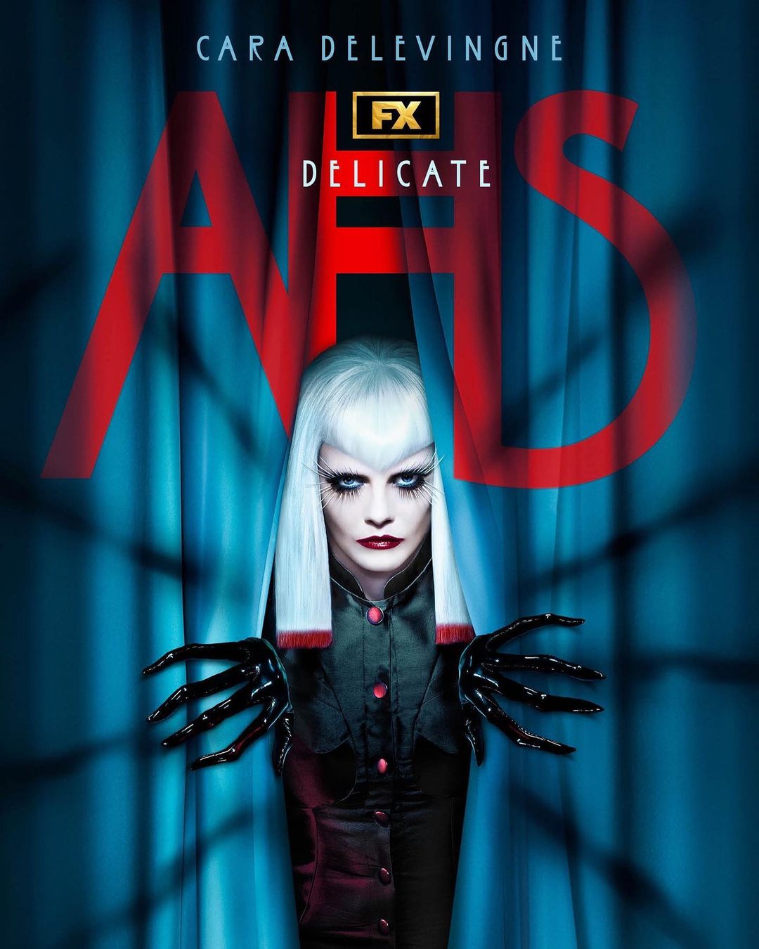 Promotional image for American Horror Story: Delicate, features Cara Delevingne with white hair, dark makeup, and elaborate claw-like gloves.
