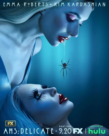 Promotional image for American Horror Story: Delicate. Two women, Emma Roberts and Kim Kardashian, with a spider hanging from one's mouth.