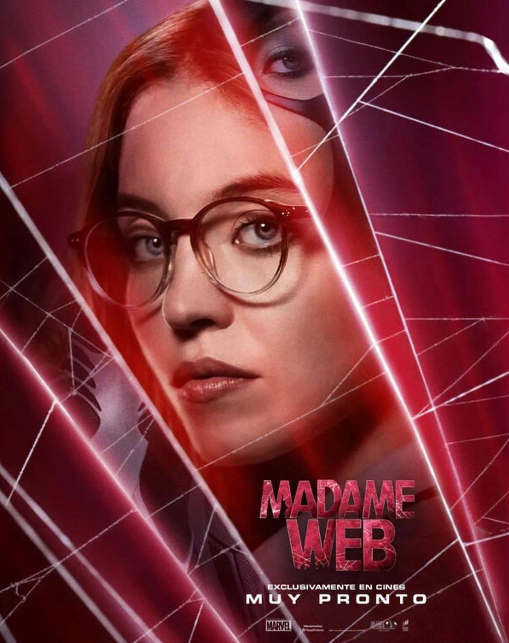 Promotional poster of Madame Web movie, featuring Sydney Sweeney with glasses, and spider web elements in the background.