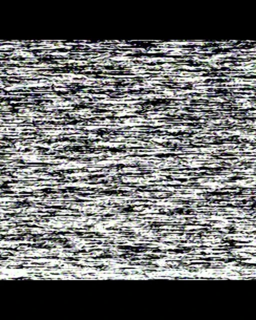 Image of digital static noise pattern with black background.