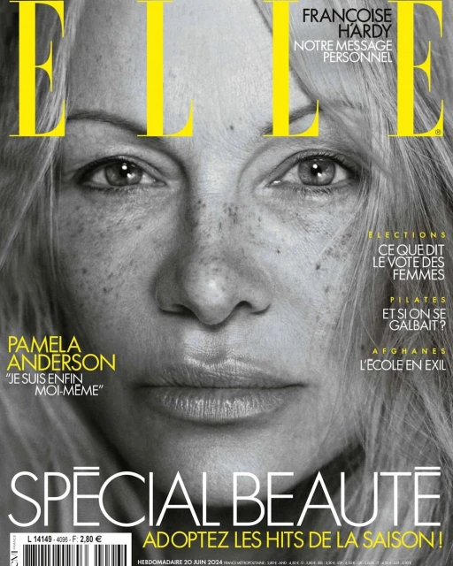 Elle magazine cover featuring a close-up portrait of Pamela Anderson, showcasing her freckled skin and natural appearance in black and white.