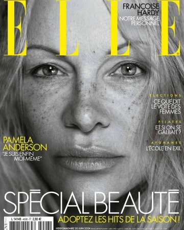 Elle magazine cover featuring a close-up portrait of Pamela Anderson, showcasing her freckled skin and natural appearance in black and white.