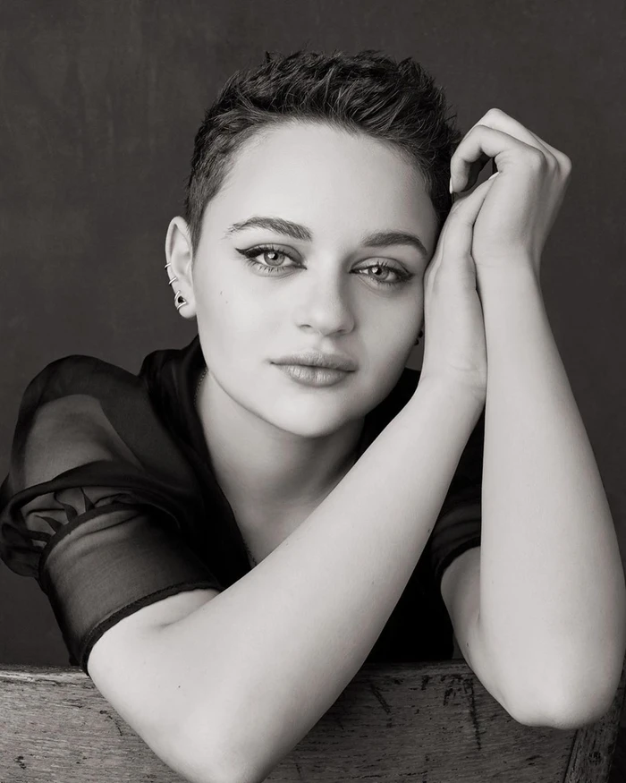 Portrait of actress Joey King with short dark hair and winged eyeliner, photographed in black and white by Sam Jones in Los Angeles.