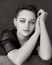 Portrait of actress Joey King with short dark hair and winged eyeliner, photographed in black and white by Sam Jones in Los Angeles.