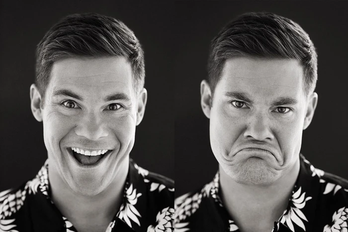 Black and white split portrait of a man making a joyful expression and a sad expression against a dark background.