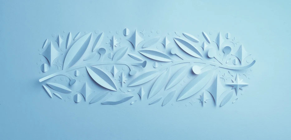Delicate paper art of leaves and stars in a light blue hue, perfect for artistic backgrounds or creative design projects.