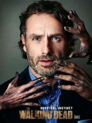 Promotional image for 'The Walking Dead' featuring Andrew Lincoln's face and hands with blackened hands around his face.