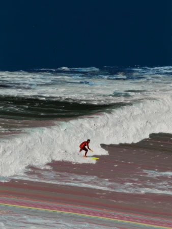 A person in a red suit is surfing a wave on a yellow surfboard in the ocean, under a blue sky.