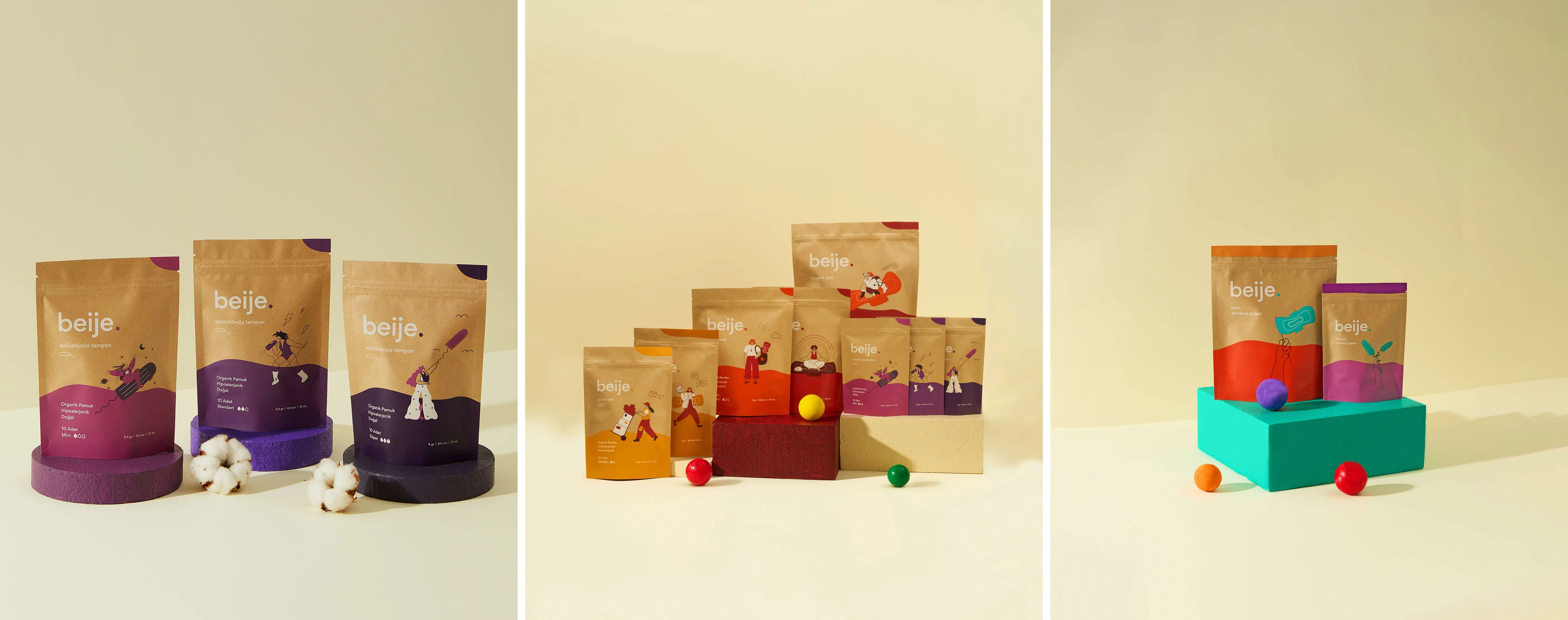 Product packaging for Beije organic cotton tampons, various sizes and colors, displayed on platforms with spheres, studio shot.