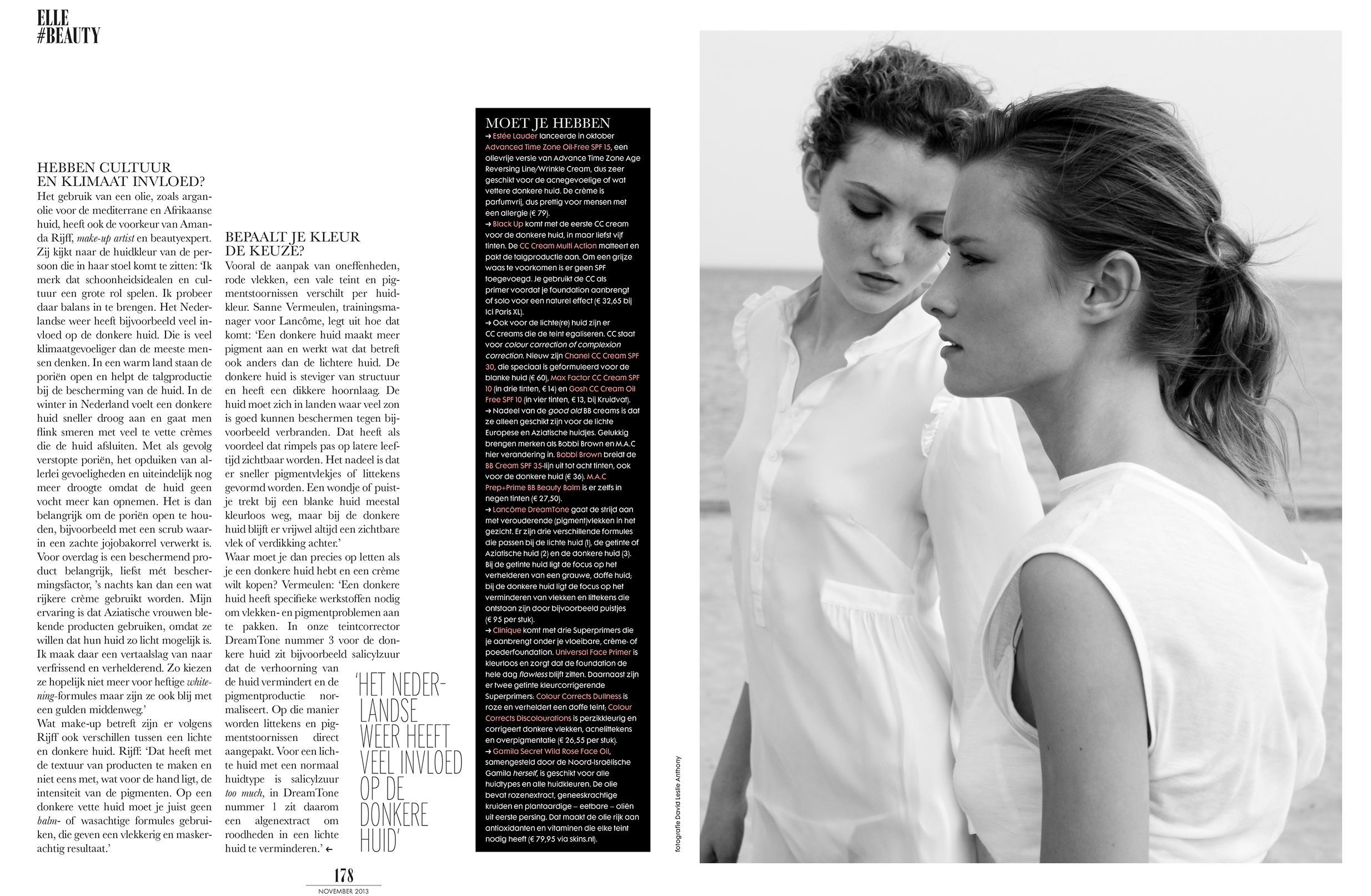 Monochrome beauty shot of two fair-skinned young women in white shirts against an outdoor background, showcasing fashion and beauty.