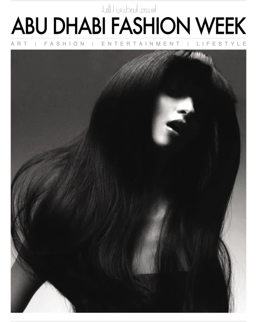 Monochrome portrait of a woman with flowing dark hair, featured in an Abu Dhabi Fashion Week ad, showcasing style and entertainment.