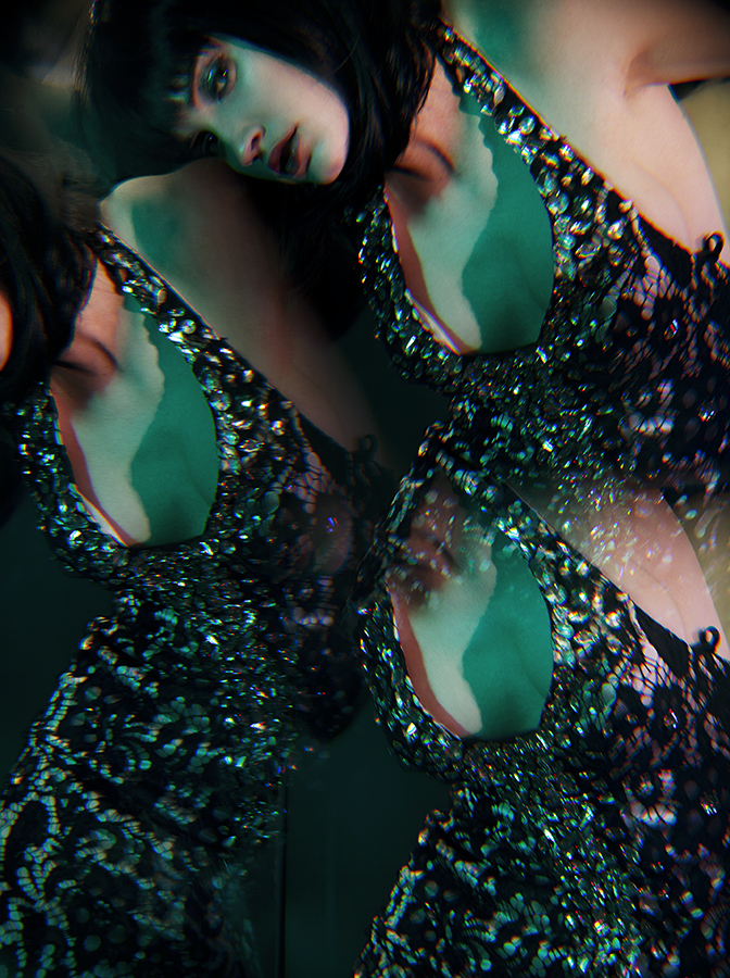 Woman with dark hair in a beaded halter dress poses with multiple exposures and bokeh for a beauty or fashion shot. 