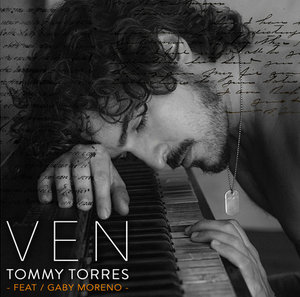 Close-up of a man with curly hair resting his head on a piano, overlayed with handwritten text, creating a textured, artistic portrait.