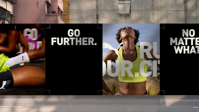 Multi-panel outdoor billboard featuring Puma branding with typography, athletic apparel, and a runner against an urban backdrop.