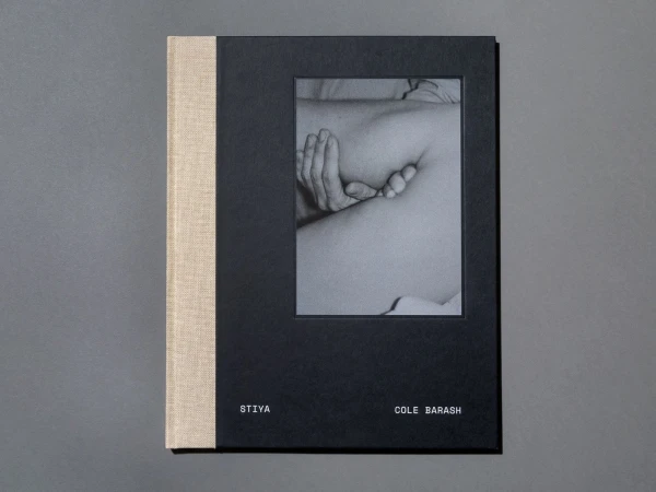 A book cover features a black and white photograph of a person's torso and hands. The book is titled 'Stiya' by Cole Barash.