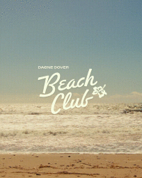 Ocean waves crashing onto a sandy beach under a clear sky with overlaid white typography reading Dagne Dover Beach Club