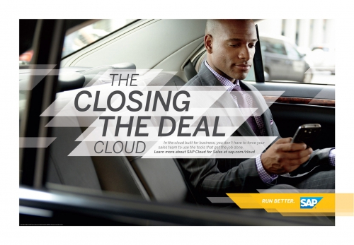Professional Black businessman in a suit using a smartphone inside a car, commercial ad for cloud services and technology solutions.