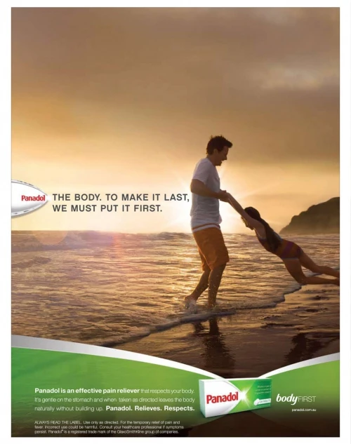 Advertising image featuring a man and woman in swimwear on a beach at sunset with ocean waves, plus a product advertisement for Panadol.