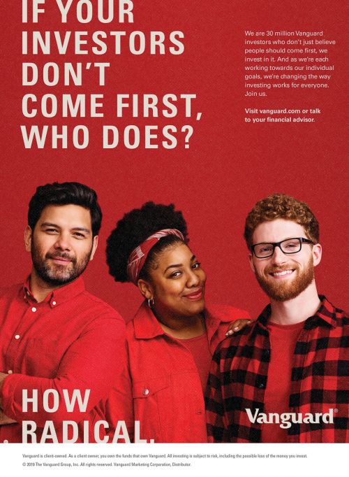 Three smiling people in red tones are featured in a financial advertising image against a red background with white text and the Vanguard logo.