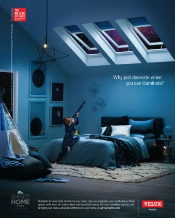 Bedroom interior with skylights showcasing a night sky view. A child in pajamas looks through a telescope. Ad for Velux skylights.