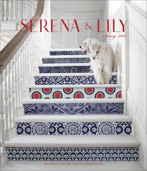 Dog sits on staircase featuring intricate patterned risers in a bright indoor setting, promoting Serena & Lily Spring 2012 collection.