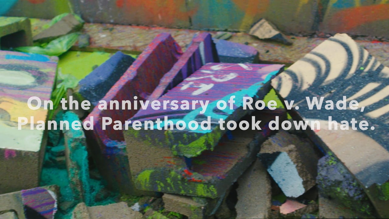 Image showing broken concrete pieces painted with various colors and graffiti-style designs, along with text overlay.