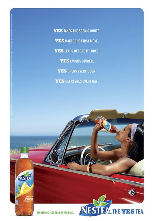 Nestea ad featuring a woman drinking iced tea in a red convertible with the ocean in the background. The ad promotes the brand with the slogan 'The Yes Tea'.