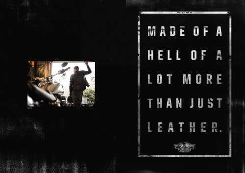 Motorcycle and man in leather jacket leaving garage, poster with slogan 'Made of a hell of a lot more than just leather'.