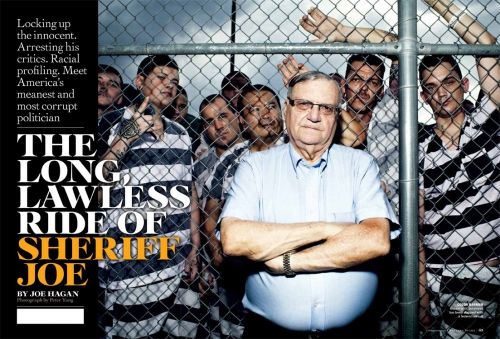 Editorial image of Sheriff Joe Arpaio standing in front of a chain-link fence with inmates in striped prison uniforms behind him.