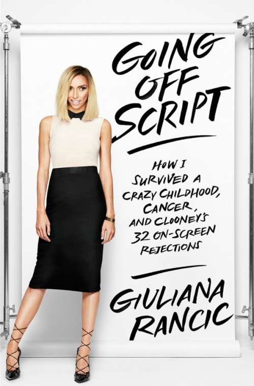 Giuliana Rancic poses next to her book "Going Off Script", standing in a studio with bright lighting and a backdrop.