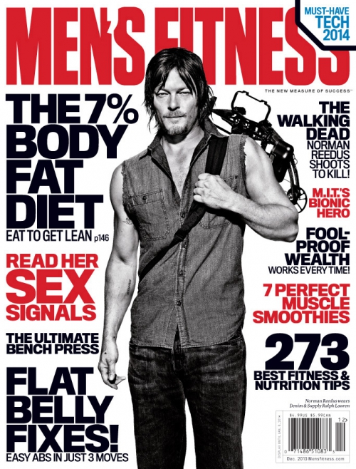 Men's Fitness cover featuring Norman Reedus in sleeveless shirt with crossbow, promoting fitness, diet, and nutrition tips on a gray background.