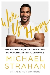 Portrait of Michael Strahan smiling with arms crossed wearing a white t-shirt against a white background with yellow overlaid typography