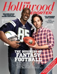 Magazine cover featuring NFL player Antonio Gates in a jersey and actor Paul Rudd holding a football.