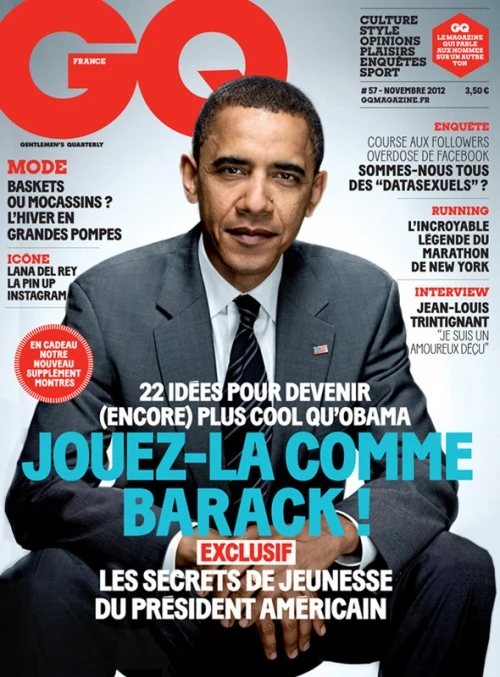Magazine cover featuring Barack Obama in a dark grey suit and tie against a white background by photographer Peter Yang.