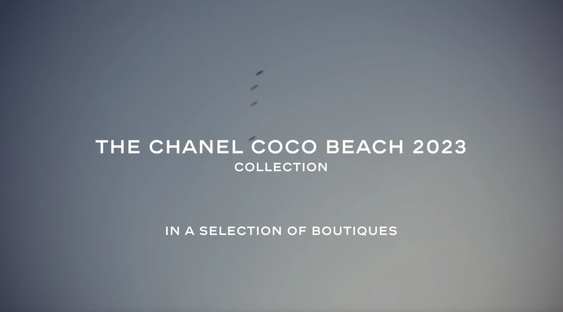 Coco Beach 2023 collection ad against a gradient gray-blue sky backdrop, featuring birds flying and promotional text for a fashion collection.