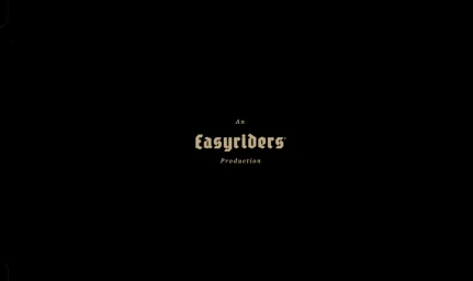 Title card with text reading An Easvriders Production centered on a solid black background.
