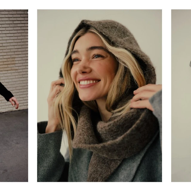 Blonde woman in hooded scarf smiles in a medium shot, wearing a textured gray coat. Studio lighting showcases fashion accessory details.
