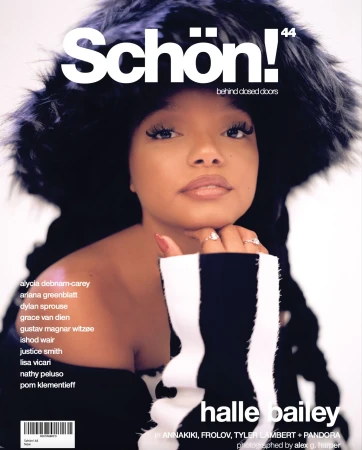 Magazine cover featuring Halle Bailey, wearing a black fur hat, a black and white sweater, with makeup and jewelry, against white backdrop.