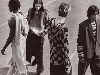 Monochrome fashion editorial image of four male models walking outdoors in Los Angeles shot by Cozy.